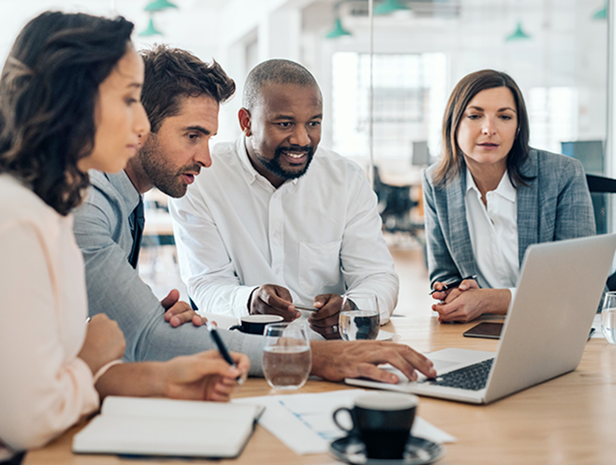 Group of office workers in a meeting room