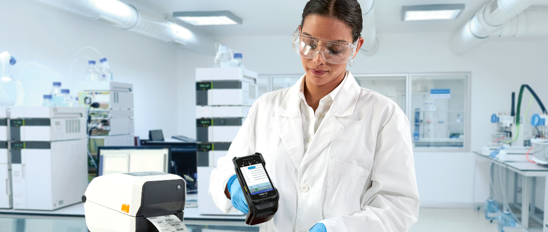 Female lab technician using a hand held scanner