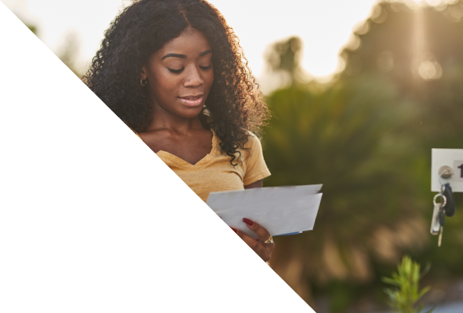 woman looking through her direct mail letters